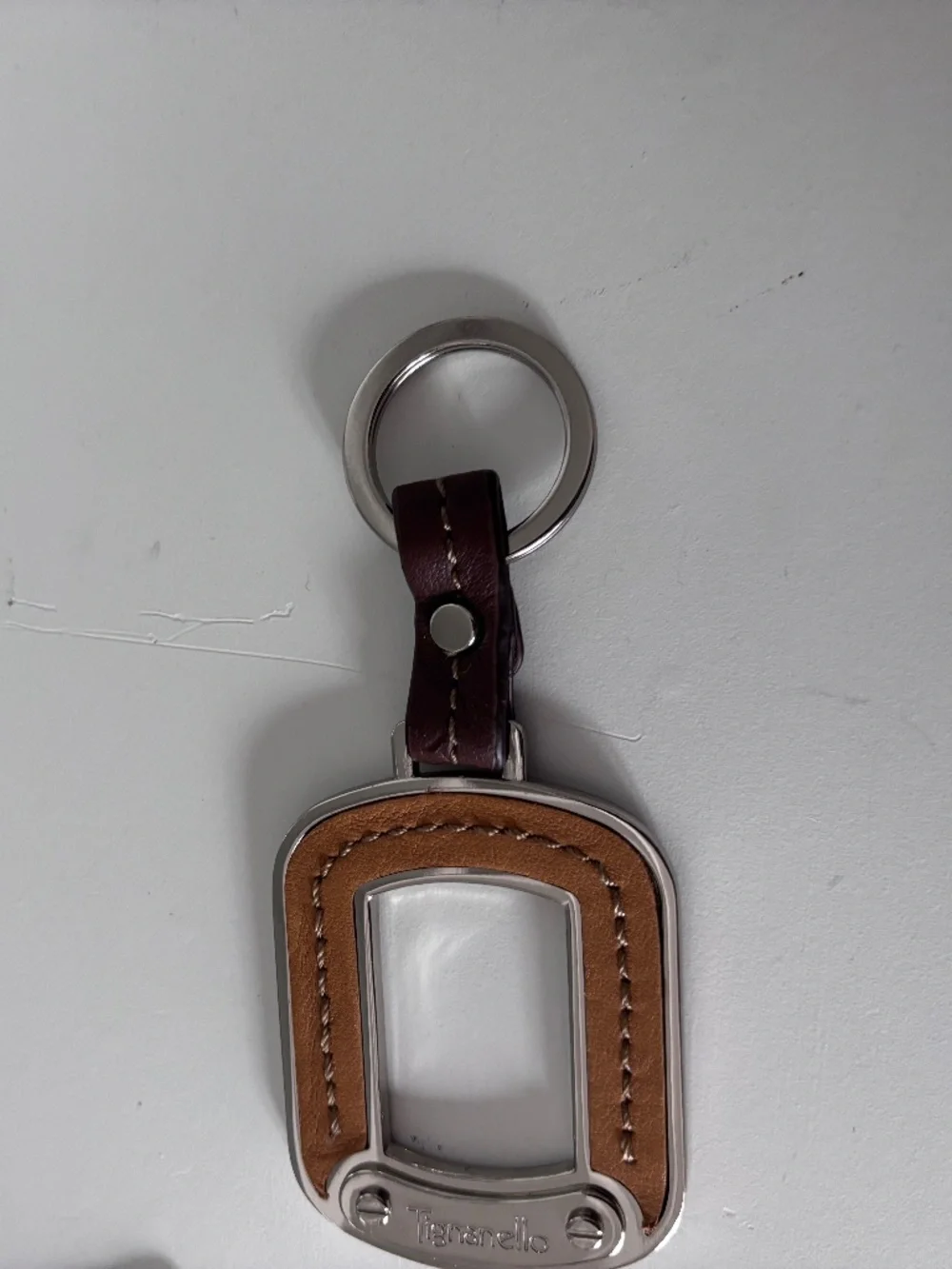 2 leather Tignanello keychains/bag charms